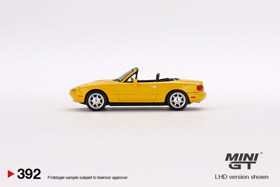 Mini GT 1:64 Mazda Miata MX-5 (NA) (Sunburst Yellow) - MGT00392-MJ